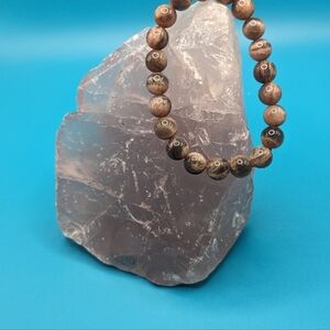 Stunning flashy black sunstone bracelet 8mm